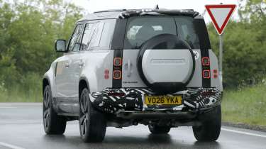 Land Rover Defender (camouflaged) - rear