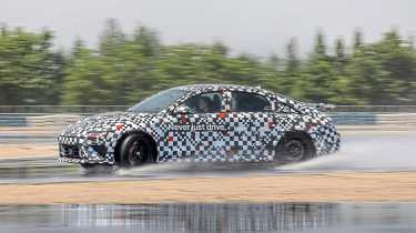 Hyundai Ioniq 6 N prototype - side action (wet)