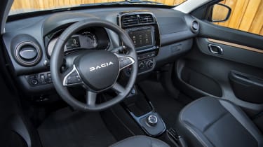 Dacia Spring LHD dashboard - side