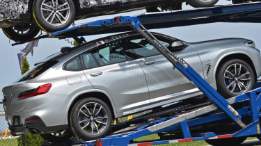 New BMW X4 spied uncovered side