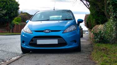 Ford Fiesta parked on pavement