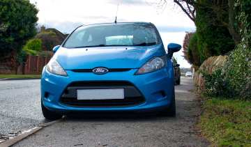 Ford Fiesta parked on pavement