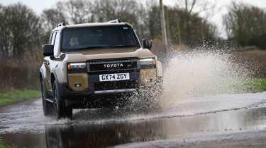 Toyota Land Cruiser - driving through water - front