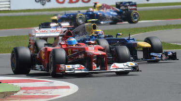 Fernando Alonso leads Mark Webber