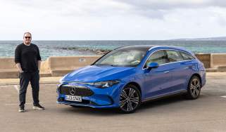 Auto Express news reporter Ellis Hyde standing next to the Mercedes CLA Shooting Brake