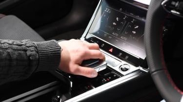 Auto Express chief reviewer Alex Ingram operating Audi Q8 e-tron gear selector