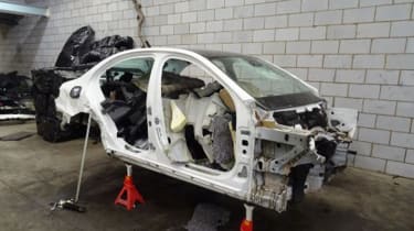 Chop shop - car broken for parts 