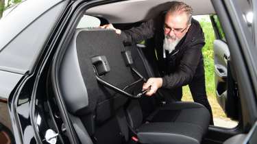 Auto Express senior test editor Dean Gibson testing Honda Jazz magic seats