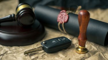 Car key and gavel