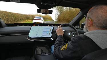 Auto Express senior test editor Dean Gibson driving the BMW iX3