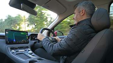 Auto Express deputy editor Richard Ingram driving the MGS6 EV Trophy Long Range