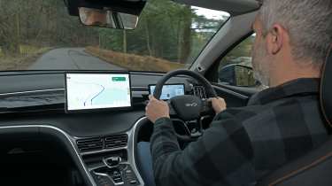 Auto Express deputy editor Richard Ingram driving the BYD Sealion 5 DM-i Design