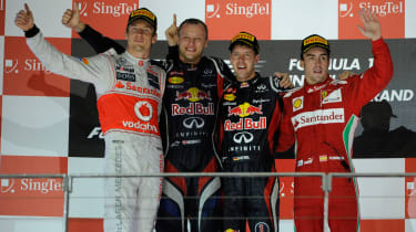 Jenson Button, Sebastian Vettel and Fernando Alonso on the podium