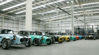 Multiple Caterhams parked in factory