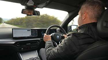 Auto Express deputy editor Richard Ingram driving the BMW 330e