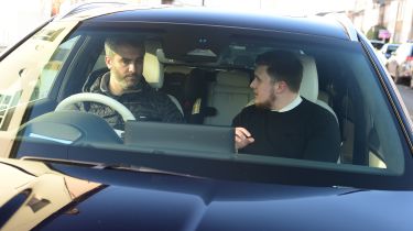 Richard having a conversation while driving