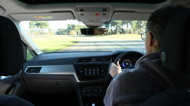 Auto Express editor Paul Barker driving a Volkswagen Touran