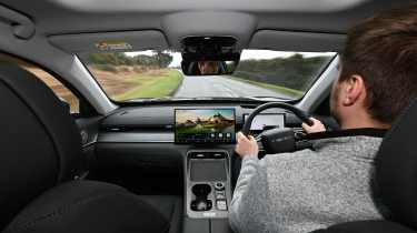 Auto Express senior news reporter Alastair Crooks driving the Chery Tiggo 8