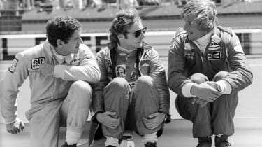 Jody Scheckter talks with Niki Lauda and race winner ￼Hunt at the 1976 German Grand Prix