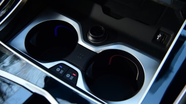 BMW X5 heated and cooled cup holders