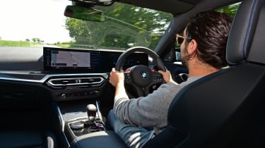 Auto Express senior staff writer Jordan Katsianis driving the BMW M2