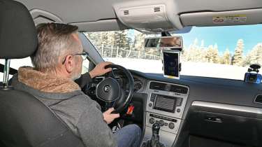 Winter tyre test 2025 - snow testing, interior, car being driven by John Barker