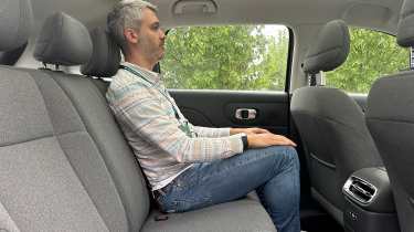 Auto Express deputy editor Richard Ingram sitting in the Leapmotor B10 prototype&#039;s rear seat