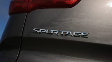 Kia Sportage 2.0 CRDi KX-3 AWD badge
