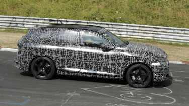 New BMW iX5 M at the Nurburgring - side action