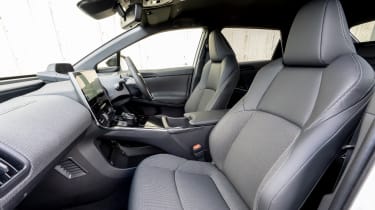 Toyota bZ4X vs Volkswagen ID.4 vs Hyundai Ioniq 5: Toyota bZ4X interior (passenger door view)