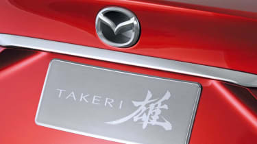 Mazda Takeri badge