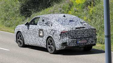 DS flagship SUV (camouflaged test car) - rear cornering