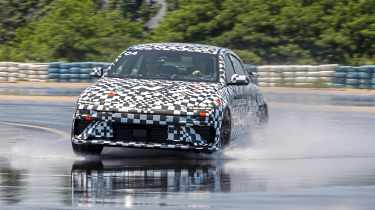 Hyundai Ioniq 6 N prototype - front cornering (wet)
