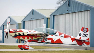 R8 Spyder vs. Extra 200 stunt plane