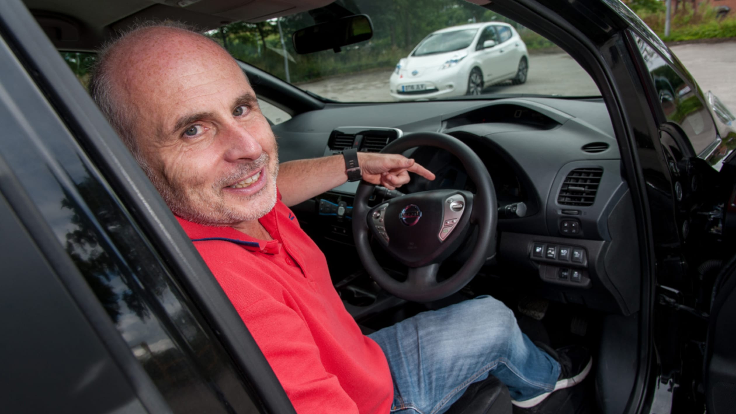 Electric car driving school learning to drive in an EV pictures