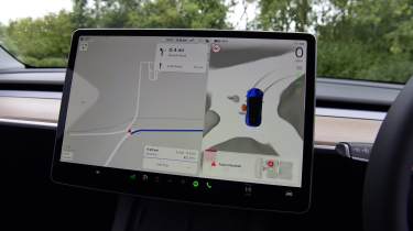 Tesla Model Y - digital drivers display and infotainment system 