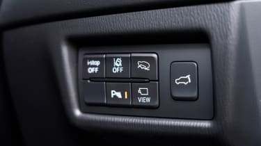 Mazda CX-5 2.5 GT Sport - driver assist buttons