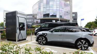 Renault Megane E-Tech plugged into charging point