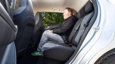 auto Express web producer Pete Baiden sitting in the MG4 Urban's rear seat
