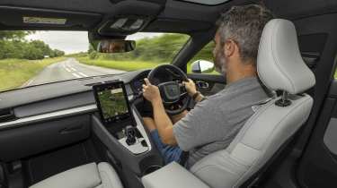 Carbuyer and DrivingElectric editor Richard Ingram driving the updated Polestar 2 in the UK