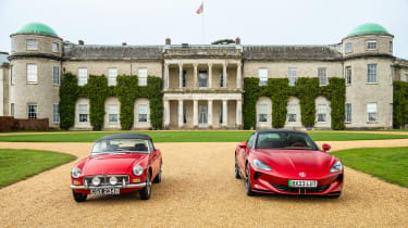 MG Cyberster and MGB parked outside Goodwood House - front static