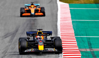 Two Formula 1 cars on track