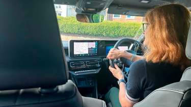 Auto Express pictures editor Dawn Grant driving the Renault 4