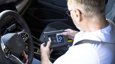 Auto Express Summer Tyre Test 2025 - John Barker setting up testing equipment 