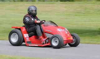 World&#039;s fastest lawnmower driven