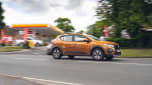 Dacia Sandero Stepway passing a petrol station