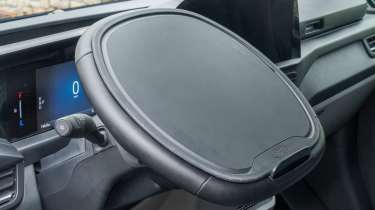 Ford E-Transit Custom - steering wheel tilted with table cover