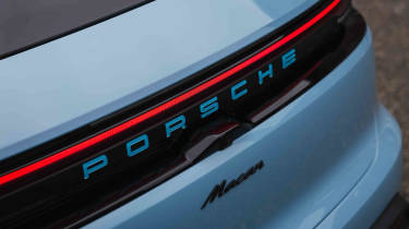 Porsche Macan Electric - &#039;Porsche&#039; logo detail