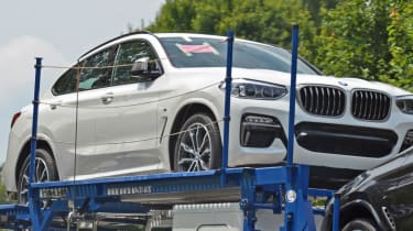 New BMW X4 spied uncovered front quarter