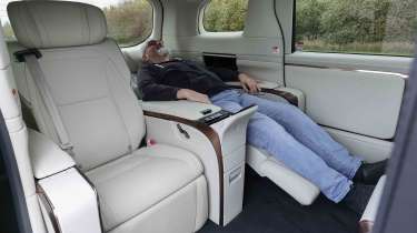 Lexus LM - Senior road test editor, Dean Gibson in reclined seating position 